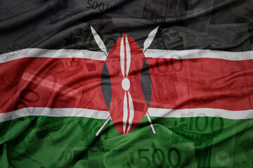 waving colorful national flag of kenya on a euro money banknotes background. finance concept.