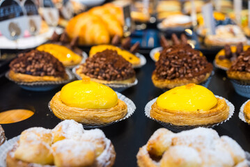 Variety of the egg tart in the bakery shop