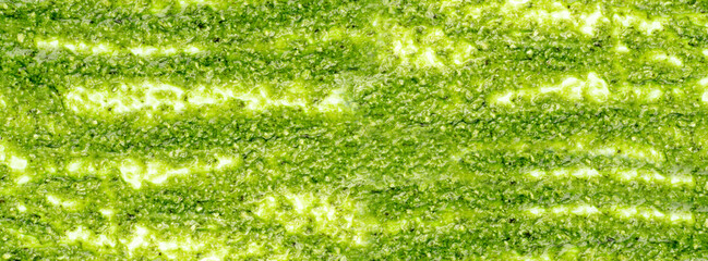 Pesto sauce spread or blob on white background