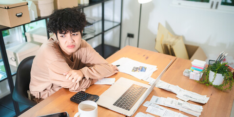 Late-night freelancer, Dedicated Asian woman working overtime on laptop computer, meeting deadlines in the sleepy Night, Businesswoman burning the midnight to working hard, sleep at working desk