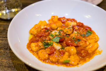 Pasta with tomato sauce in restaurant