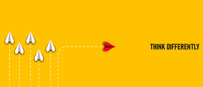 red paper plane that thinks differently than others.
business creativity new idea discovery innovation technology. new year idea concept.