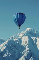 Hot Air Balloon Soaring Over Mountain Range