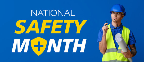 Young male engineer with blueprint on blue background