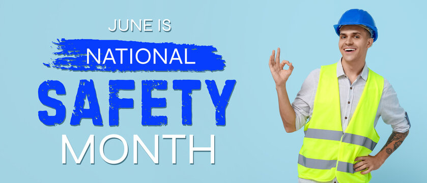 Young male engineer showing OK on blue background - Powered by Adobe