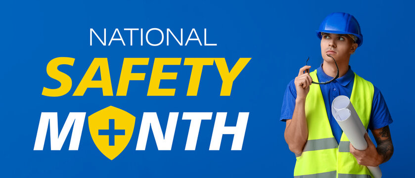 Young male engineer with blueprint on blue background