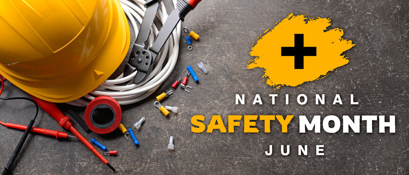 Electrician's supplies with hard hat on grey background