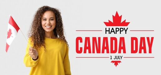 Happy young African-American woman with Canadian flag on light background. Banner for Canada Day