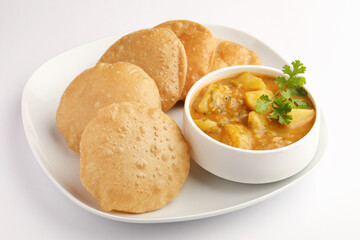 Puri Bhaji North Indian Poori with aalu bhaji aalu sabji potato spicy recipe breakfast food a deep...