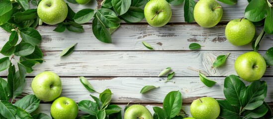 Group of green apples surrounded by leaves - Powered by Adobe