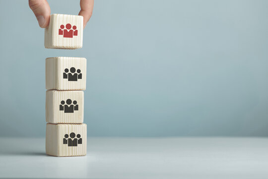 Assembled wooden cubes on the theme of business leadership