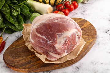 Uncooked raw pork knuckle with spices