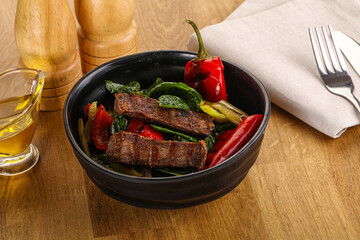Salad with grilled beef steak