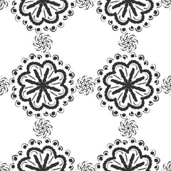 Seamless abstract botanical pattern. Black flowers on white background. Ethnic ornament. Digital brush strokes. Design for textile fabrics, wrapping paper, background, wallpaper, cover.