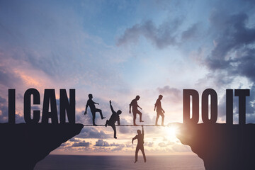 Silhouettes of people walking on a rope between rocks, success concept