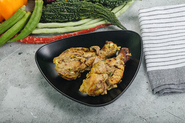 Chicken leg tikka with spices