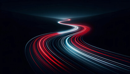 red and blue light trails on a winding road at night