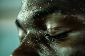 Fototapeta premium Intense Focus: A Boxer Meditating Before Training to Achieve Mental Preparation and Inner Peace