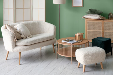 Modern interior of living room with cozy sofa and coffee table