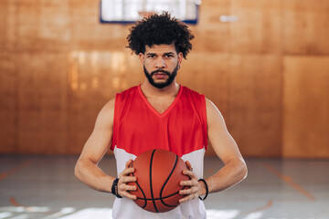 Portrait of a hispanic professional basketball player with the afro hair