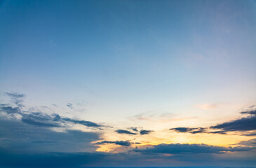 Dramatic cloudy sky background. Orange cloudy sunset sky.