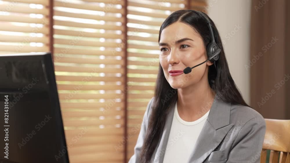 Aufkleber female call center operator or customer service helpdesk staff working on workspace while talking on