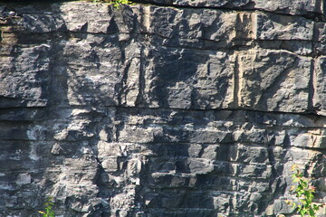 landscape natural stone wall view with plant from hotel motels window,nature background,wonderful...