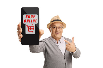 Elderly gentleman pointing at a smartphone isolated on white background