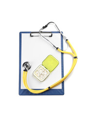 Clipboard, plastic pill box and stethoscope on white background, top view