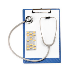 Stethoscope, pills and clipboard isolated on white, top view. Medical tool