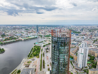 Yekaterinburg skyscraper aerial panoramic view at spring or autumn in clear sunset. Yekaterinburg is the fourth largest city in Russia located on the border of Europe and Asia.