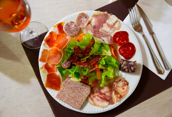 Traditional Catalan salad with sausage and ham
