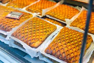 Popular Spanish Easter meat pie in the Salamanca region called Hornazo, laid out on the counter for...