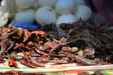mexican market, dry chile, called huajillo on display for sale, mexican ingredient