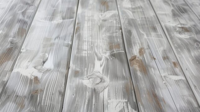 A closeup shot of a grey wooden table with a blurred background. The rectangle shape, parallel pattern, and monochrome photography enhance the monochrome tones and textures of the wood surface