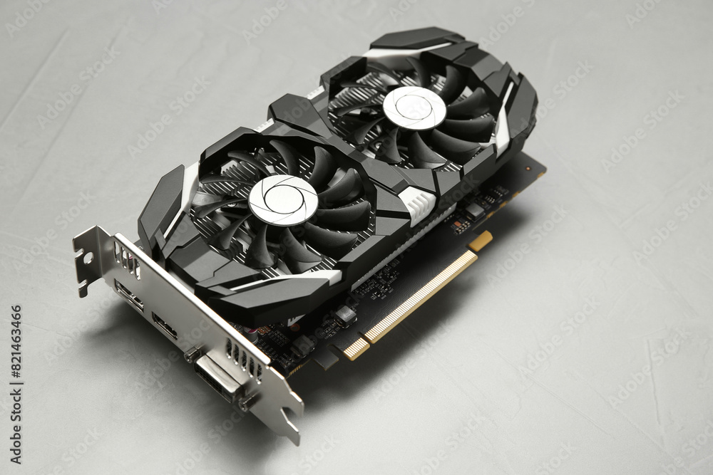 Poster computer graphics card on gray textured background