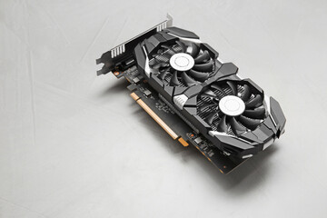 Computer graphics card on gray textured background, space for text