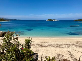 Fototapeta premium Beach and blue sea in Ksamil, Albania