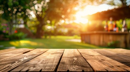 Empty wooden table across summer time in backyard garden