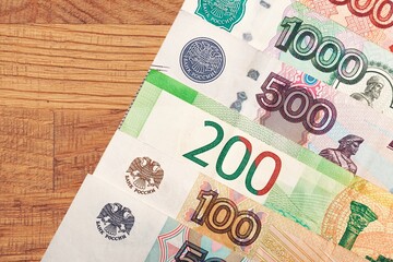 Euro banknotes money on wooden desk