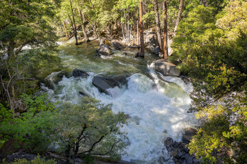 A view of the rushing water of the Merced River from the Mist Trail at Yosemite National Park.