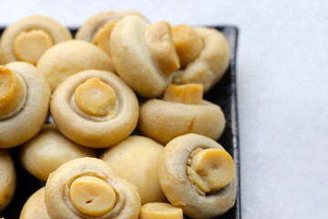 Champignon mushrooms in brine. Canned champignon mushrooms whole