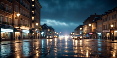 wet city street at night with streetlights reflecting on the pavement.