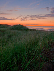 Blue and Orange Sky Sunset Over Dunes