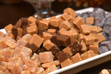 candy table chocolates party buffet wedding decoration dishes flowers arrangements restaurant dining table