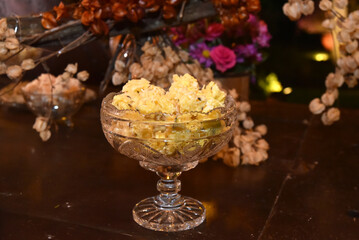 candy table chocolates party buffet wedding decoration dishes flowers arrangements restaurant dining table