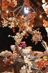 candy table chocolates party buffet wedding decoration dishes flowers arrangements restaurant dining table