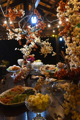 candy table chocolates party buffet wedding decoration dishes flowers arrangements restaurant dining table