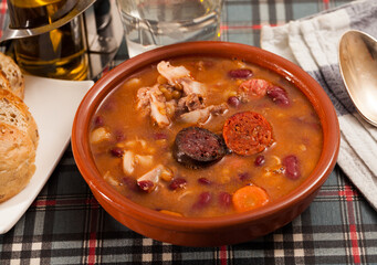 Traditional dish of Asturian cuisine - beans stewed with pork, blood sausage and chorizo (Fabada)...