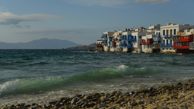 Colorful buildings along the ocean in Mykonos, Greece